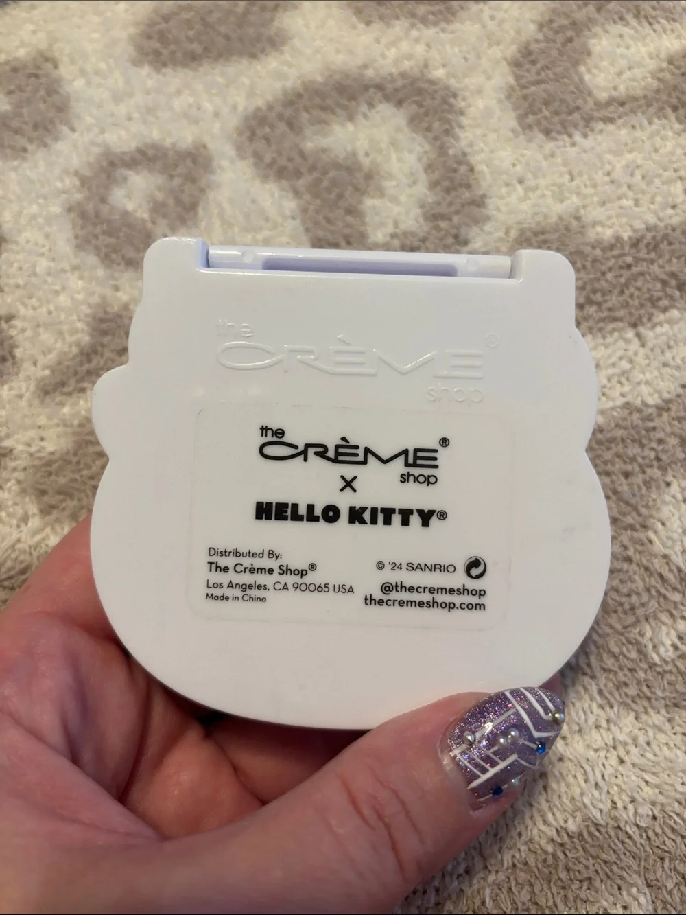 Hello Kitty x The Creme Shop Hello Kitty blotting paper Compact with Red Bow
